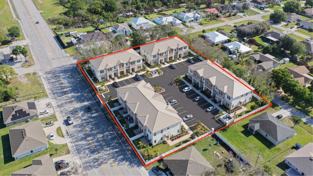 Photo of 274 NE Saint James Drive, Port Saint Lucie, FL 34983 (MLS # B26017714)