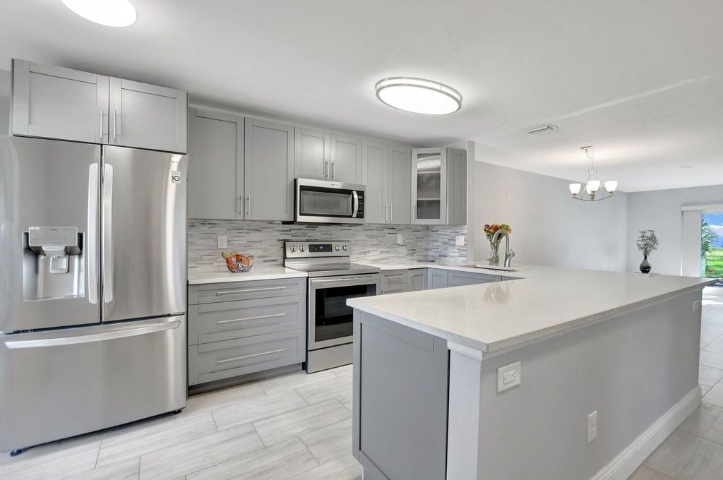 Photo of 8734 Chevy Chase Drive, Boca Raton, FL 33433 (MLS # R11124709)