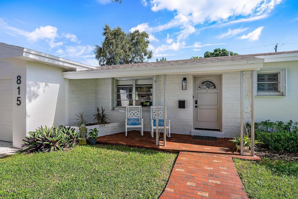 Photo of 815 2nd Court, Lake Park, FL 33403 (MLS # R11141179)