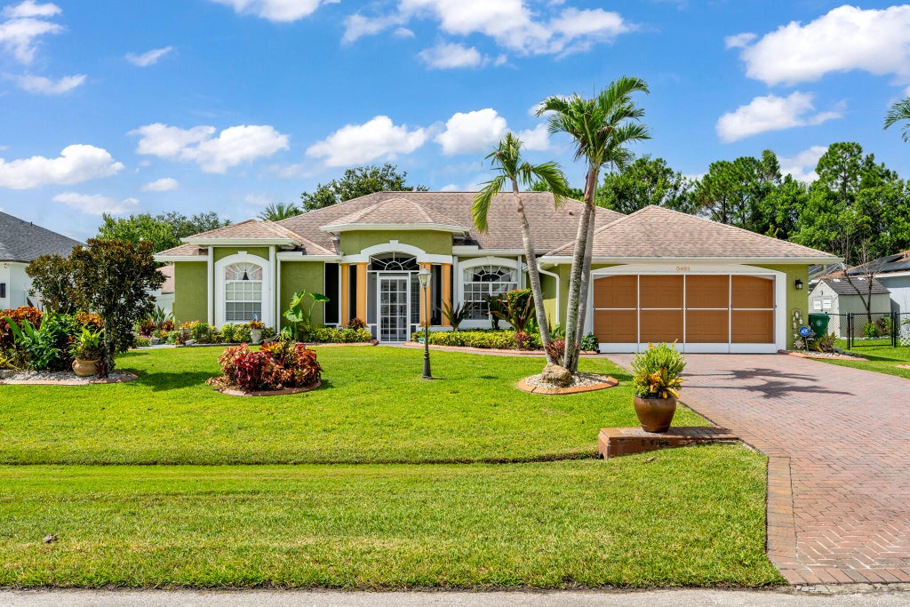 Photo of 5493 NW Chapel Court, Port Saint Lucie, FL 34986 (MLS # B26056705)