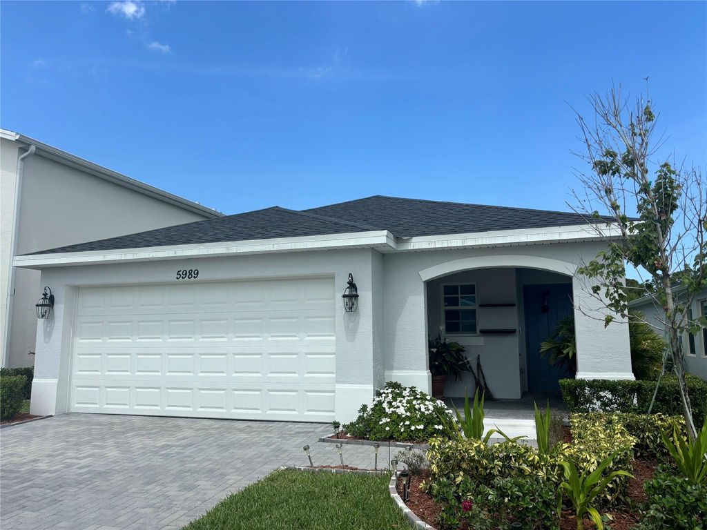 Photo of 5989 NW Sweetwood Drive, Port Saint Lucie, FL 34987 (MLS # F10508693)