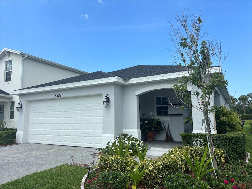 Photo of 5989 NW Sweetwood Drive, Port Saint Lucie, FL 34987 (MLS # F10508693)
