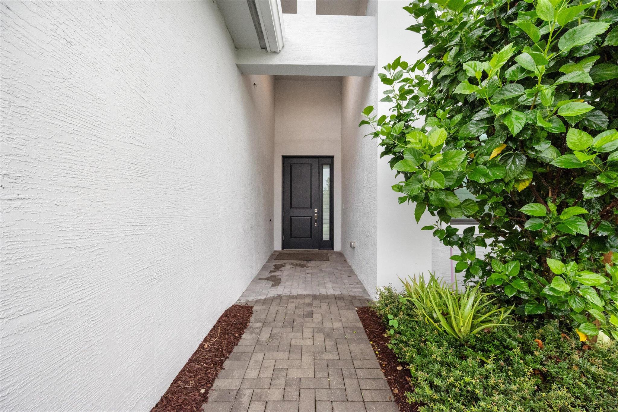Stunning Fiesta model available for rent in Cresswind Palm Beach, Westlake's premier 55+ community. This 3 bedroom, 3 bath home with a den offers open living and designer upgrades throughout. The gourmet kitchen features quartz counters, upgraded cabinetry, and a spacious island perfect for entertaining. Main living areas are finished with upgraded flooring and recessed lighting, while all baths include upgraded tile, cabinets, and quartz surfaces. Additional highlights include plantation shutters, a screened and covered patio, and no rear neighbors for added privacy.Cresswind Palm Beach residents enjoy an active lifestyle with a clubhouse that offers a full-time activities director, SmartFIT Training Center powered by EGYM, pickleball, tennis, arts & crafts, game rooms, resort-style