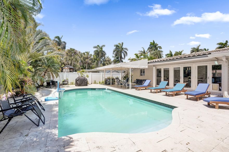 Exquisite move-in ready beach-walkable home in Dolphin Isles. Bright natural light highlights timeless charm with modern updates throughout. Fabulous private backyard features a large heated sparkling pool, fire pit, and borders Hugh Taylor Birch State Park, offering rare privacy and tranquil views. Insect misting system and sprinkler system provide added comfort and convenience. Ideally located in one of Fort Lauderdale's most desirable beachside communities. Luxury, privacy, and relaxation just moments from the beach, dining, and shopping. Pet considered. Short-term available, 3-month minimum at $9,000/month.