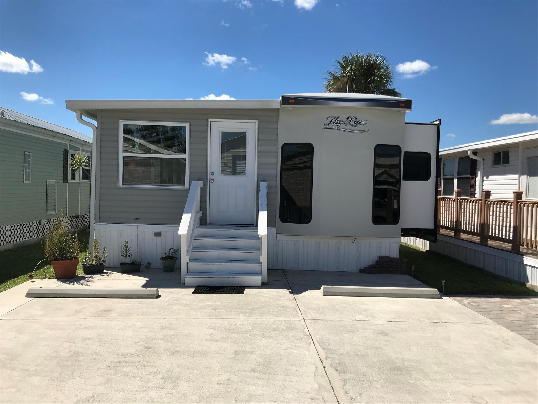 *TURTLE COVE 55+ COMMUNITY IN BUCKHEAD RIDGE RIGHT OFF THE RIM CANAL* Property features a mint condition 2019 39.5 ft. Hyline park trailer with a brand-new addition converts it to a roomy park model. New floors throughout, rolled roof 2025 and new air conditioner 2023. The new deck is composite boards and overlooks the beautiful water, perfect for fishing or just relaxing watching the sunrise and sunsets. 20X40 insulated garage for all your toys!! Garage has electric, water and plumbed for sewer. TURN KEY!! Call for your appointment today!!