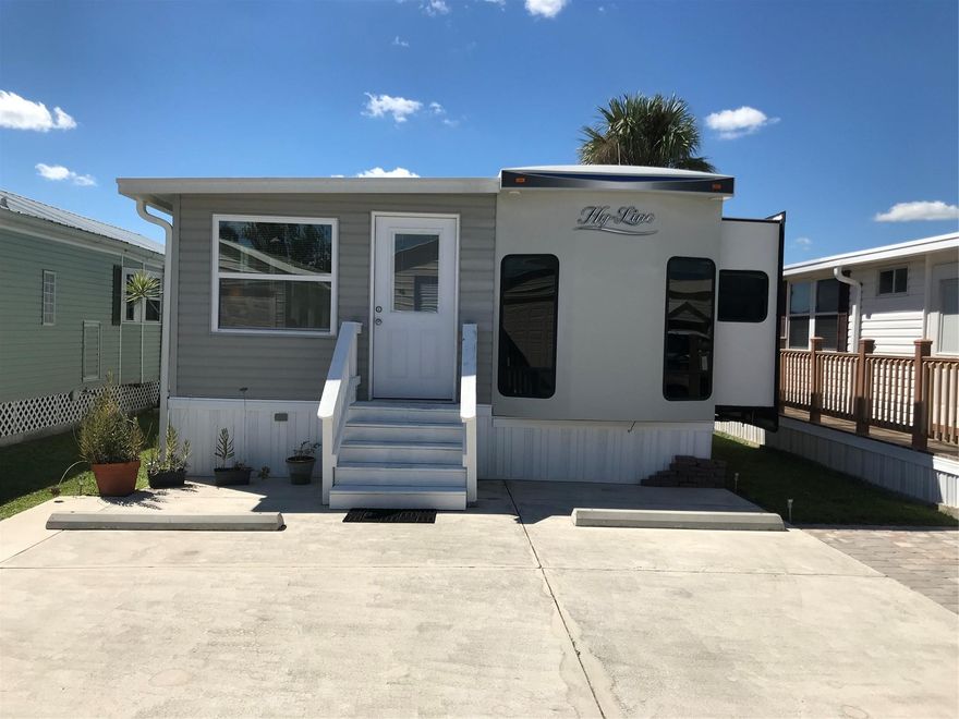 *TURTLE COVE 55+ COMMUNITY IN BUCKHEAD RIDGE RIGHT OFF THE RIM CANAL* Property features a mint condition 2019 39.5 ft. Hyline park trailer with a brand-new addition converts it to a roomy park model. New floors throughout, rolled roof 2025 and new air conditioner 2023. The new deck is composite boards and overlooks the beautiful water, perfect for fishing or just relaxing watching the sunrise and sunsets. 20X40 insulated garage for all your toys!! Garage has electric, water and plumbed for sewer. TURN KEY!! Call for your appointment today!!