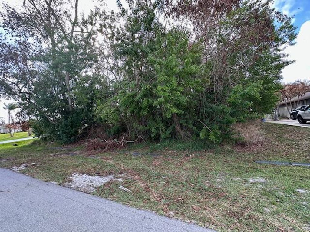 Photo of 6864 NW Jorgensen Road, Port Saint Lucie, FL 34983 (MLS # B26030423)