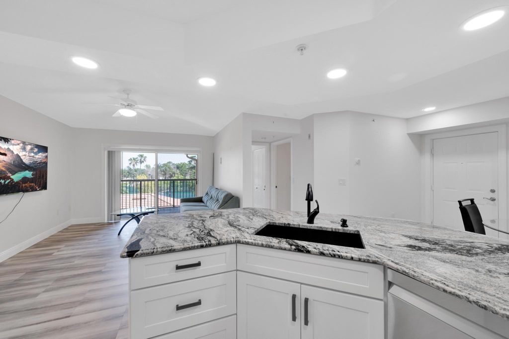 Photo of 3744 NW Adriatic Ln #307, Jensen Beach, FL 34957 (MLS # F10435677)