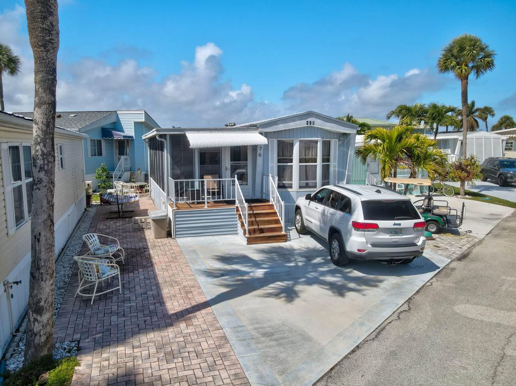 Photo of 976 Nettles Boulevard, Jensen Beach, FL 34957 (MLS # R11169010)