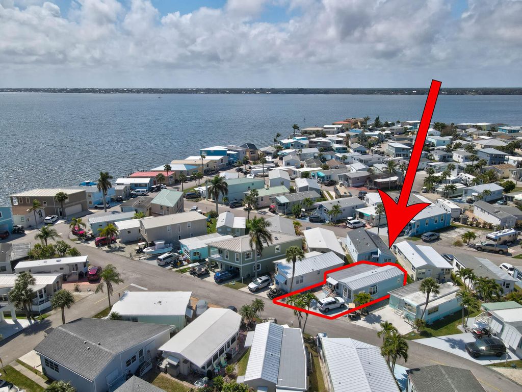 Photo of 976 Nettles Boulevard, Jensen Beach, FL 34957 (MLS # R11169010)