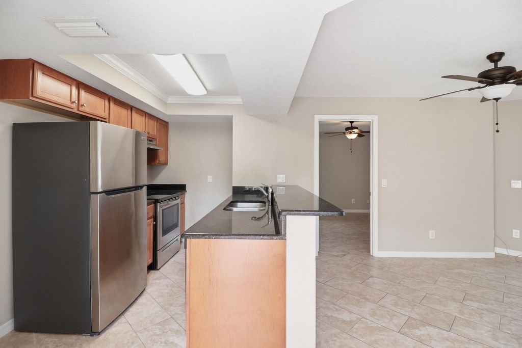 Photo of 2625 Heathcote Drive #2623, Fort Pierce, FL 34982 (MLS # B26015084)