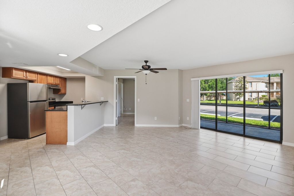 Photo of 2625 Heathcote Drive #2623, Fort Pierce, FL 34982 (MLS # B26015084)
