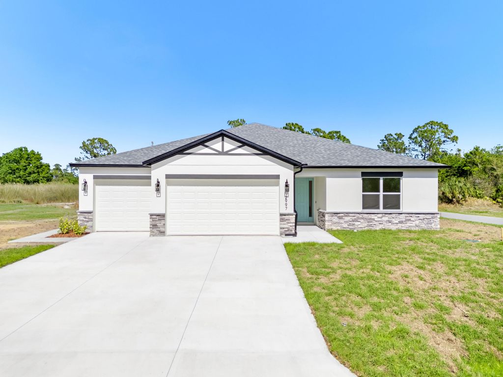 Photo of 2997 SE Tivoli Ave #2997, Palm Bay, FL 32909 (MLS # B26005185)