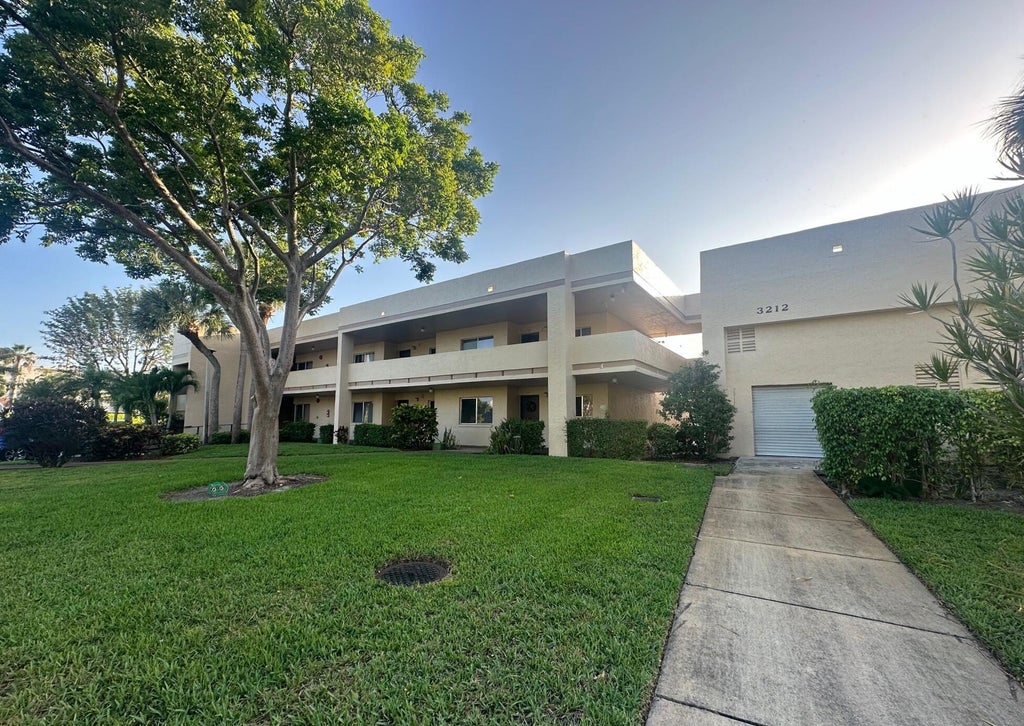 Photo of 3212 Strawflower Way #202, Lake Worth, FL 33467 (MLS # R11095979)