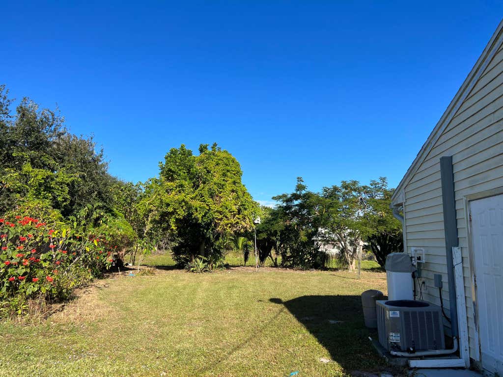 Photo of 1710 SW Monterrey Lane, Port Saint Lucie, FL 34953 (MLS # R10932443)