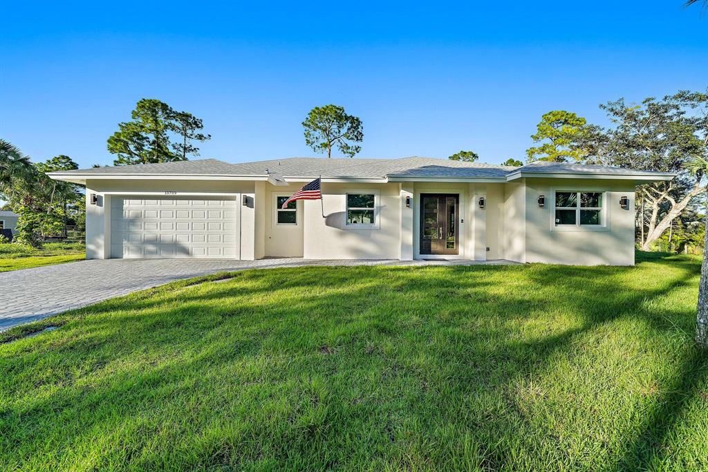 Photo of 15789 60th Place N, Loxahatchee, FL 33470 (MLS # R10757956)