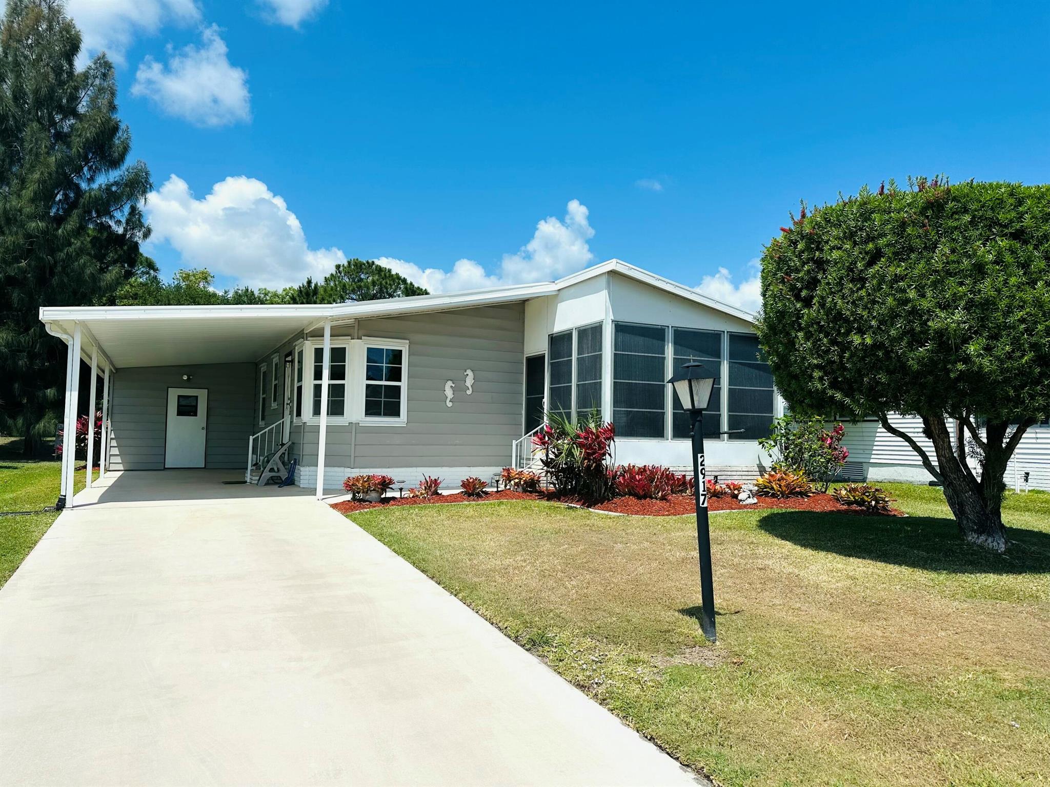 Land Owned- your winter retreat or summer getaway awaits you in the Savanna Club 55+ community. Recent updates include luxury vinyl thru/out, SS appliances, knockdown ceiling, 2025 A/C, new HWH, 2021 roof, newer windows, update tie downs and more.... home is move in ready