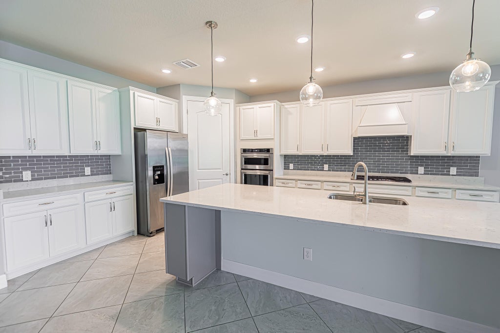 Photo of 12977 SW Aureolian Lane, Port Saint Lucie, FL 34987 (MLS # R11027018)