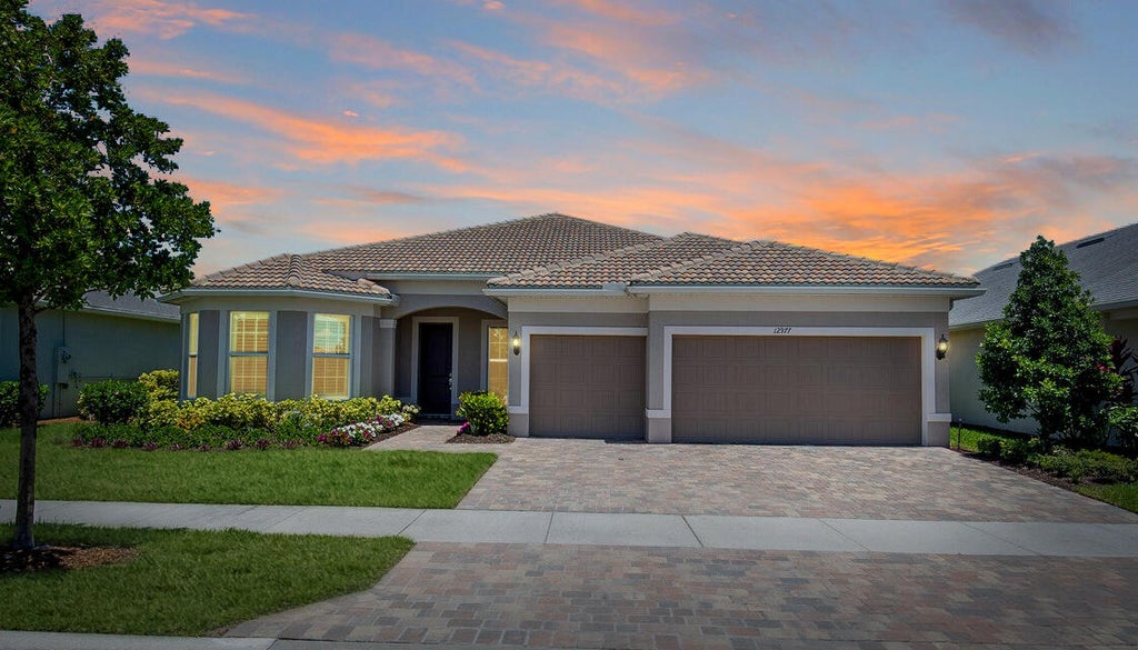 Photo of 12977 SW Aureolian Lane, Port Saint Lucie, FL 34987 (MLS # R11027018)