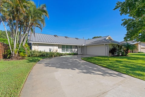 Photo of 4456 Nicole Circle, Jupiter, FL 33469 (MLS # B26077424)