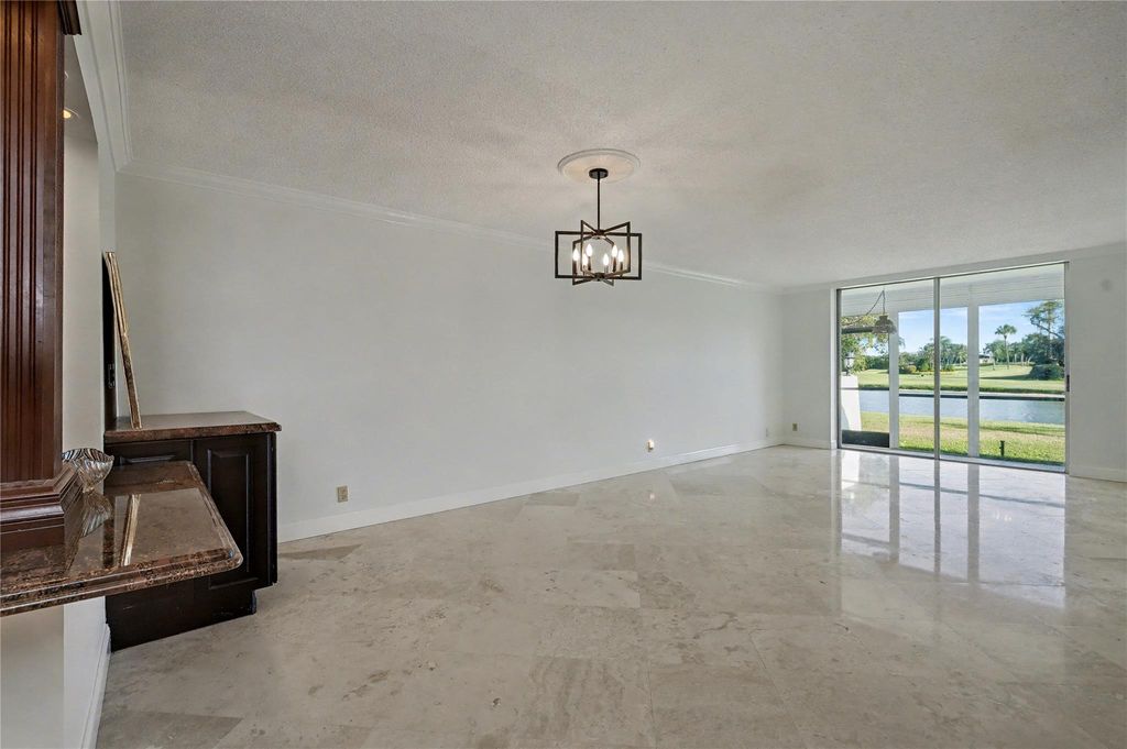 Photo of 9320 S Hollybrook Lake Dr #103, Pembroke Pines, FL 33025 (MLS # F10538605)