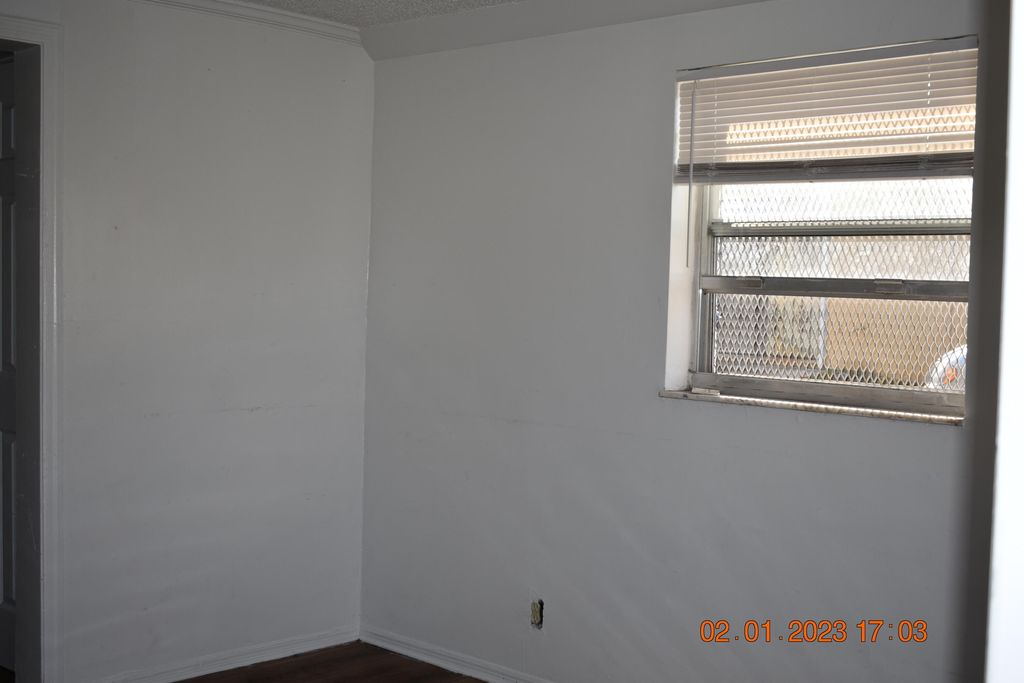 Photo of 1305 W 25th Street, Riviera Beach, FL 33404 (MLS # B26019366)