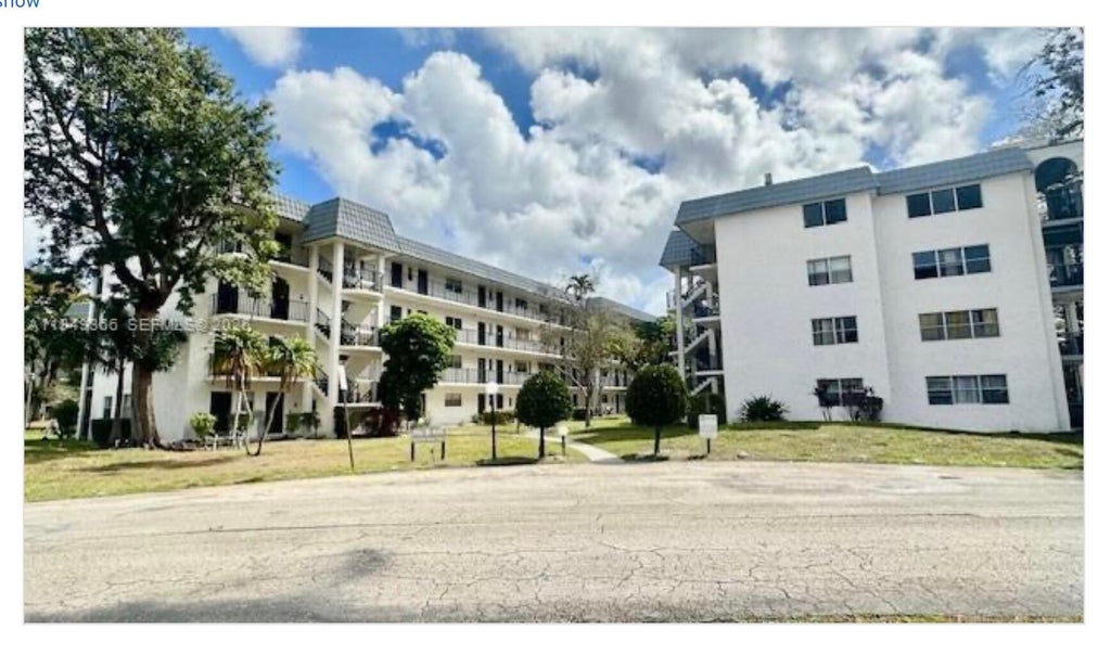 Photo of 3330 Spanish Moss Terrace #212, Lauderhill, FL 33319 (MLS # B26072680)