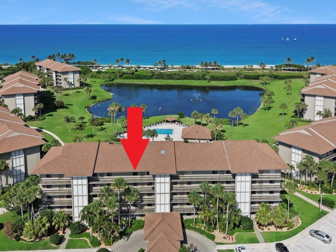 Annual oceanfront rental with sweeping direct ocean views! This fully furnished condo has been completely remodeled, featuring NEW impact doors and windows, modern tile flooring, and a bright open floor plan. Enjoy breathtaking ocean vistas from expansive balconies off both the living room and primary suite, along with serene views of the pool and open green space. The 2-bedroom, 2-bath residence also includes a versatile bonus room currently set up as a third bedroom. Watch the boats go by and take advantage of private gated beach access just steps away. The community offers a resort-style lifestyle with a pool, tennis courts, and close proximity to shops, dining, and entertainment. Rare opportunity--this is one of the few units in the development grandfathered with tile flooring thru-out