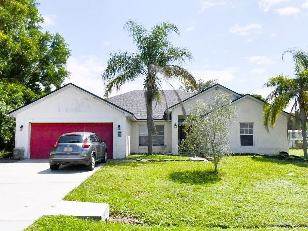 Photo of 5155 NW North Macedo Boulevard, Port Saint Lucie, FL 34983 (MLS # R11086287)