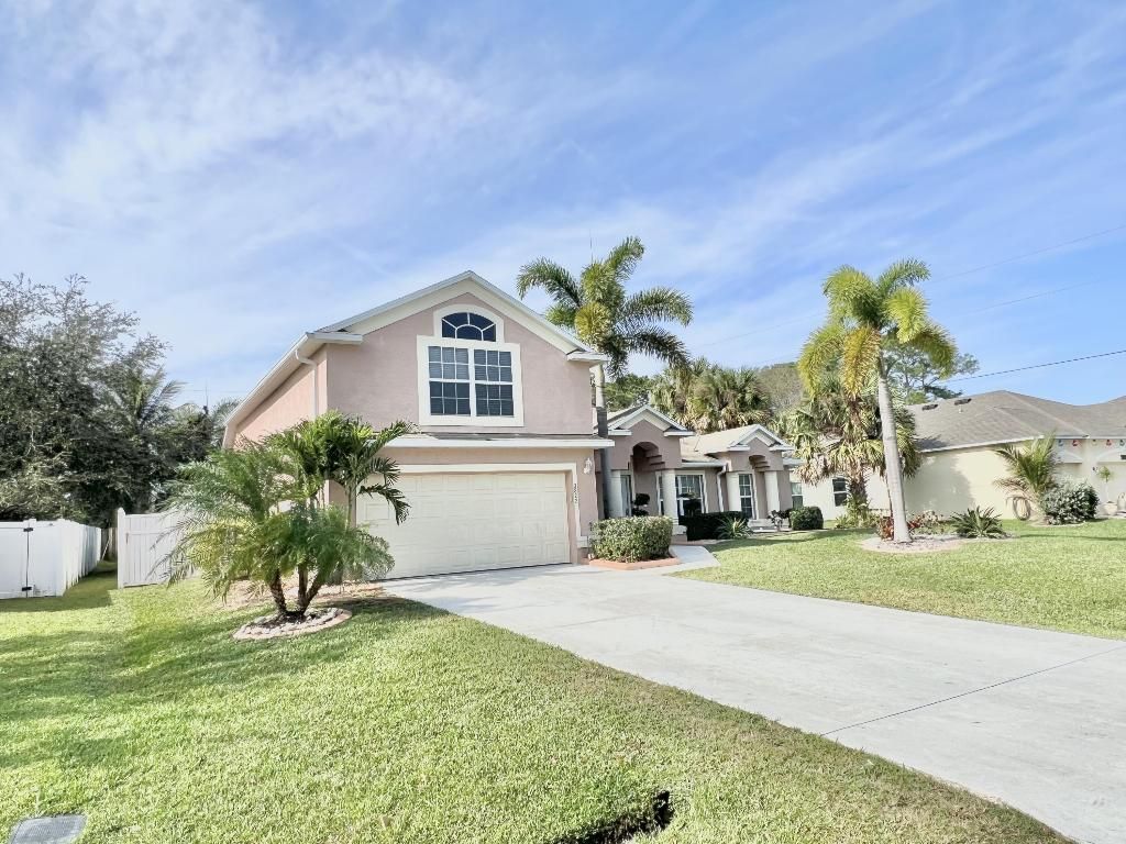 Photo of 3822 SW Ruark Street, Port Saint Lucie, FL 34953 (MLS # R10945506)