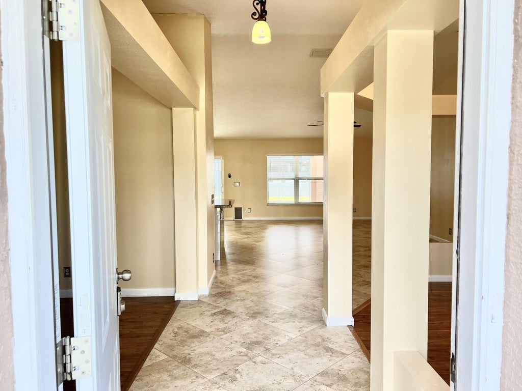 Photo of 3822 SW Ruark Street, Port Saint Lucie, FL 34953 (MLS # R10945506)