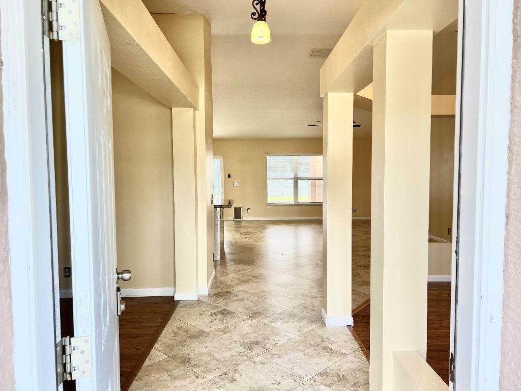 Photo of 3822 SW Ruark Street, Port Saint Lucie, FL 34953 (MLS # R10945506)