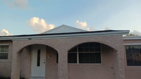 Photo of 336 NW 7th Court, Deerfield Beach, FL 33441 (MLS # F10552438)