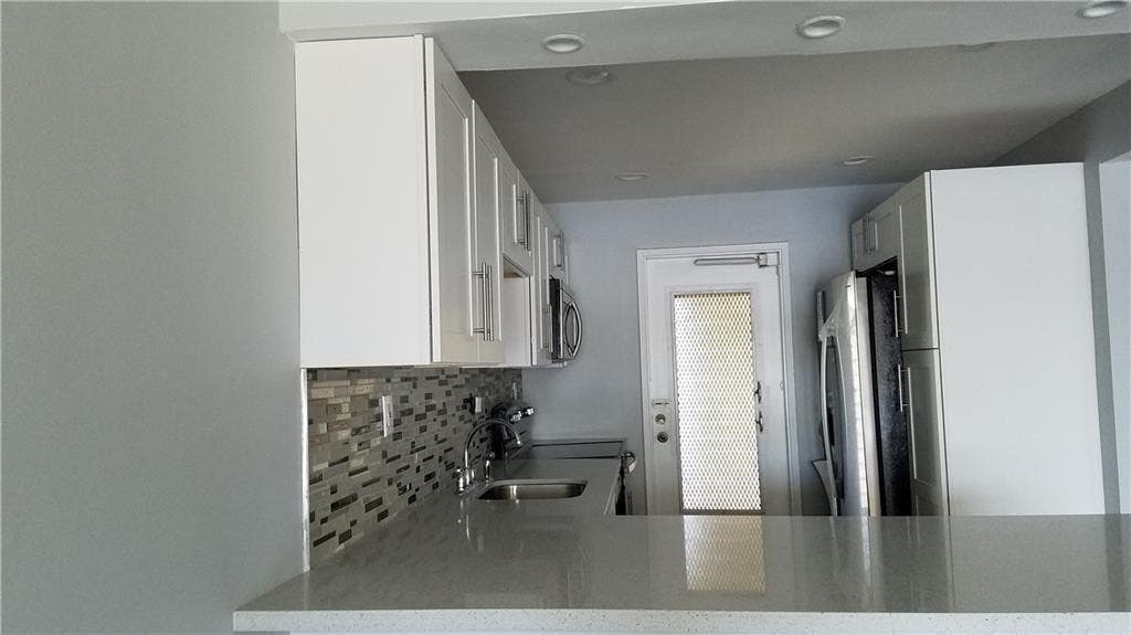 Photo of 3100 N COURSE Lane #210, Pompano Beach, FL 33069 (MLS # B26065152)