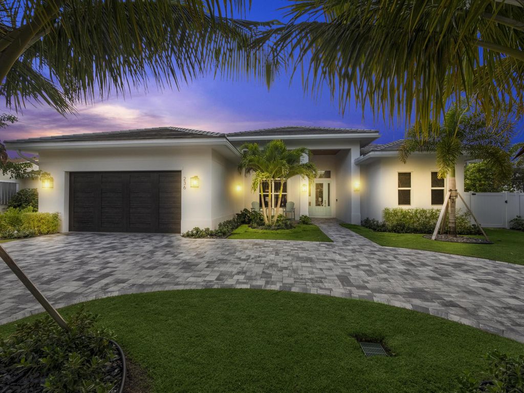 Photo of 236 Cascade Lane, Palm Beach Shores, FL 33404 (MLS # R10941610)