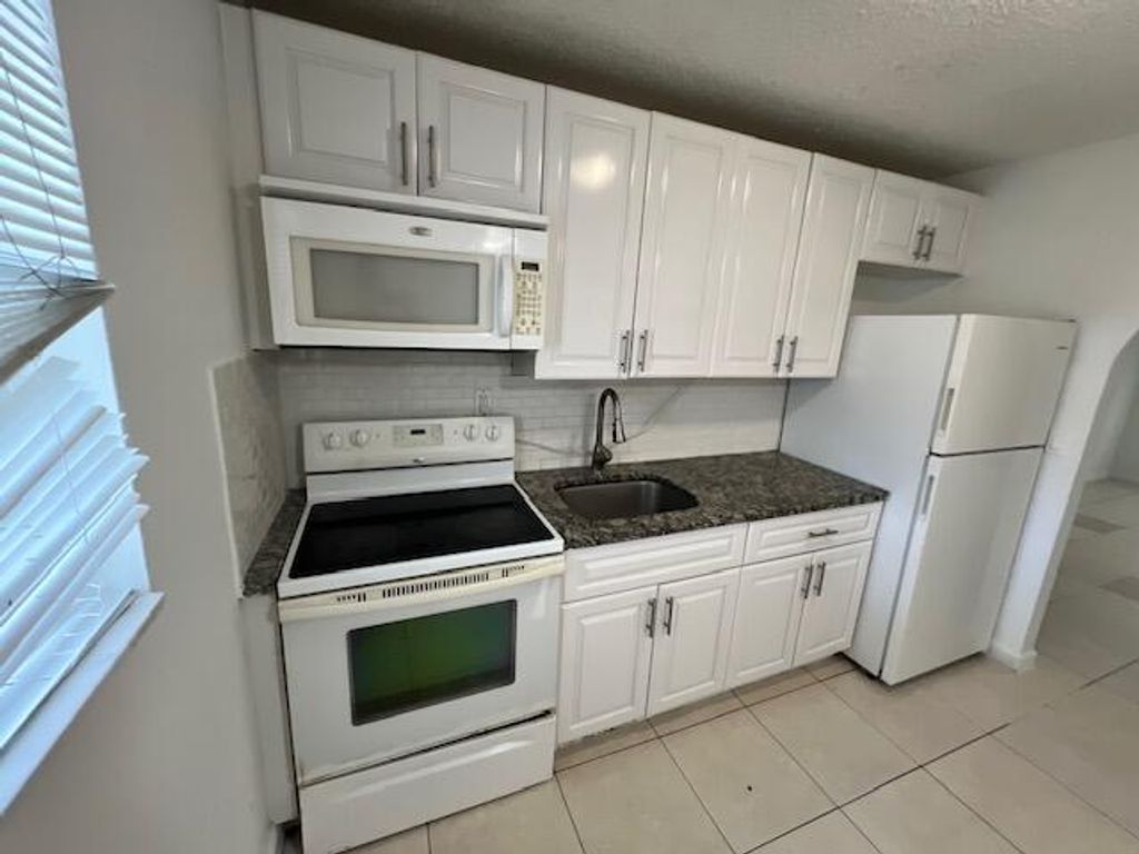 Photo of 3425 Grace Avenue, Palm Springs, FL 33461 (MLS # R11017083)