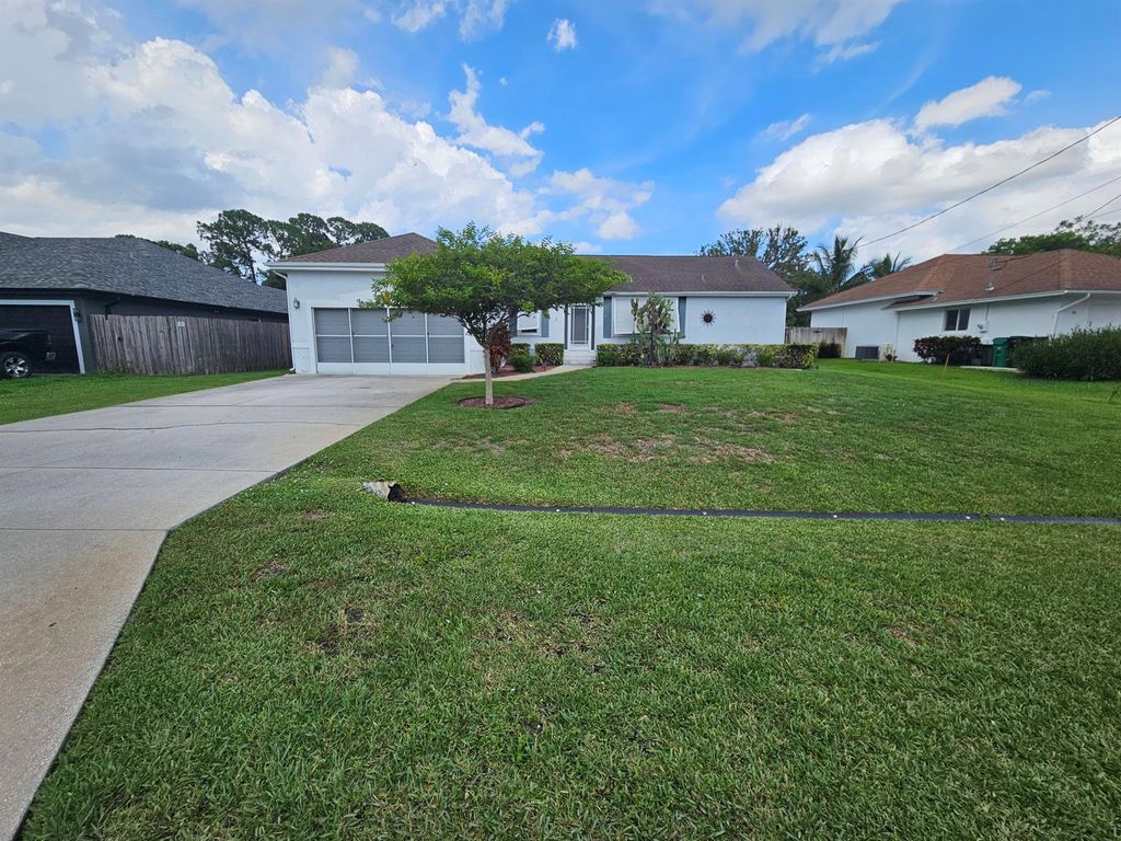 Photo of 3817 SW Cheribon Street, Port Saint Lucie, FL 34953 (MLS # R11097399)