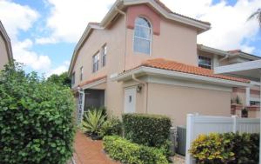 Located in the community of Palms Isles this large 2 bedroom, 2 bath, 2 story condo on the 2nd floor will surely meet all your needs.  This unit has its very own private elevator.  Beautiful lake view from your very own screened, tiled and enclosed patio.  Great for evening entertaining.   With over 1600 under air square footage, open floor plan with stack bedrooms, giving you all the space you will need and not feel like you live in a condo at all.  Living room has double sliding glass doors leading out to your enclosed patio as well has the master bedroom having access as well.  Master suite has walk-in closet and master bath has duel sinks and walk-in shower.  Carpet and tile through-out the unit.  Guest bedrooms and nice size to accommodate everyone.  Guest bathroom has tub/shower shower combo.  Ready and waiting for the new owner's to add their decorative touch and call home.   Not to mention a very nice sized office space.  Community maintain the grounds and landscaping for the owner's to enjoy their garden like setting.  Amenities include, pool, clubhouse, exercise room, game room, library, tennis and so much more.  Community is located in West Boynton Beach and is close to shopping, fine dining and just 5 minutes to the Florida Turnpike, 15 minutes to I-95.