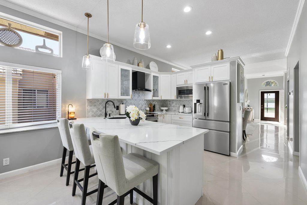 Photo of 5029 Heron Place, Coconut Creek, FL 33073 (MLS # R11169661)