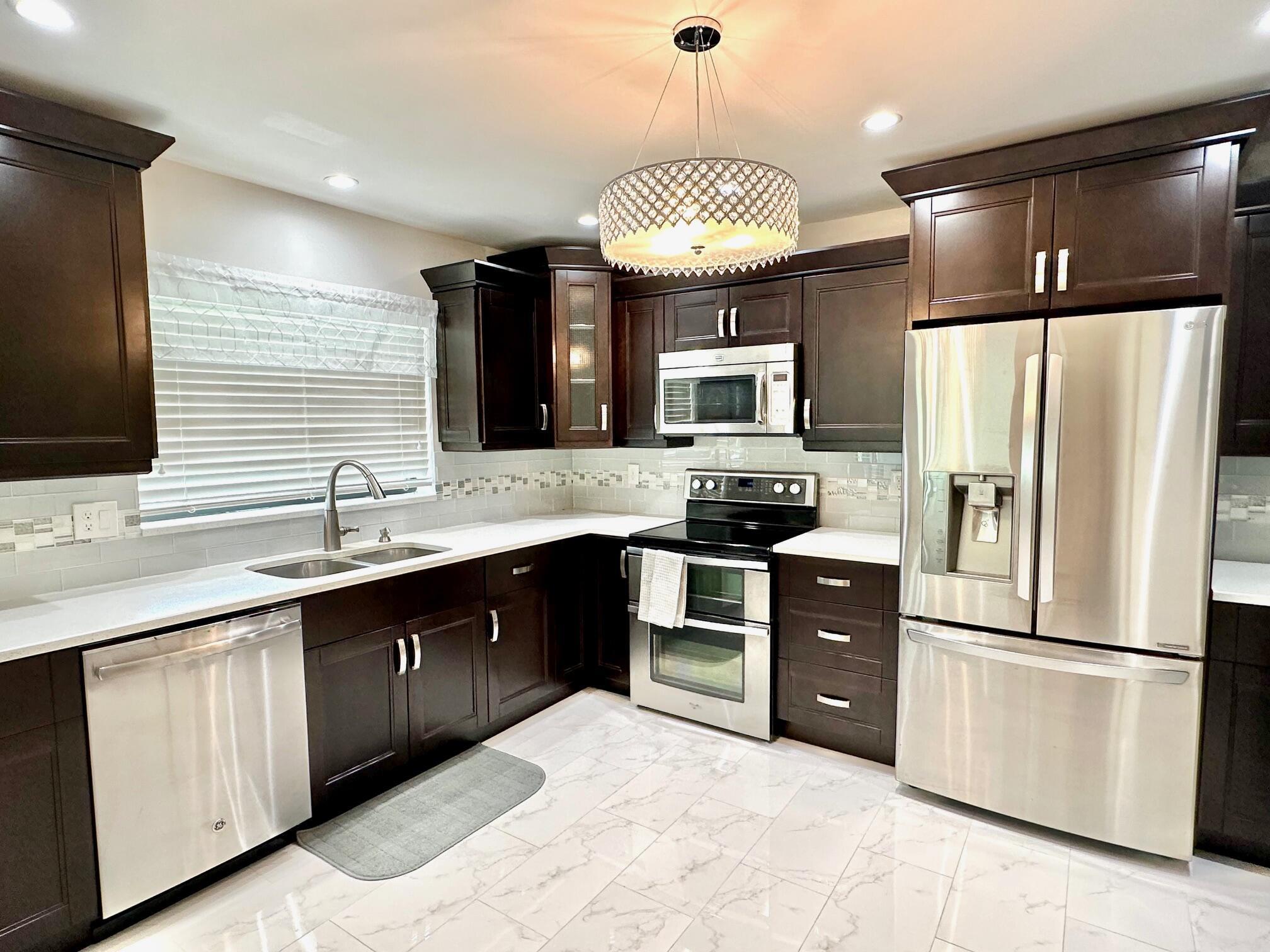 Motivated seller! This stunning cul-de-sac villa is a must-see, boasting meticulous updates throughout. Enjoy a modern kitchen with stainless steel appliances and granite counters. Say goodbye to popcorn ceilings and hello to crown molding and 6-panel doors. Relax in the spacious master bedroom with a walk-in closet and beautifully updated en-suite. With recent upgrades including A/C is 2021 , W/H 2019, and New Electric Panel, comfort is ensured. Outside, discover hurricane protection with accordion shutters and impact hurricane doors, perfect for peace of mind. Enjoy leisurely days grilling on your private patio, relax by the pool or take part in social gatherings in the clubhouse in this vibrant 55+ community. HOA includes cable, water, insurance, outside maintenance! Call today!