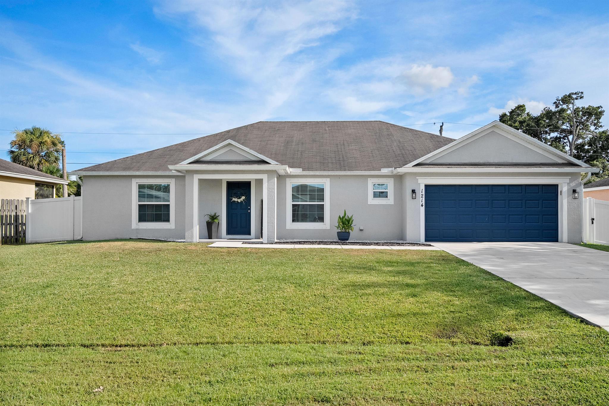 Florida oasis! This spacious 4-bedroom, 2-bath pool home is located in the heart of Port St. Lucie and offers the perfect blend of comfort, function, and outdoor living. Step inside to find an inviting layout featuring a bright and open living space, a well-equipped kitchen, and an indoor laundry room for added convenience.Enjoy Florida living at its best in the fully fenced backyard, complete with a sparkling pool--ideal for relaxing or entertaining. The 2-car garage offers plenty of storage, and the split bedroom floor plan provides privacy for the primary suite.Located near shopping, dining, and schools, this home is move-in ready and waiting for its new owner. Don't miss this opportunity to own a beautiful pool home with everything you​​‌​​​​‌​‌​​​‌‌​​​‌‌‌​​‌​​‌‌​​​​ need!