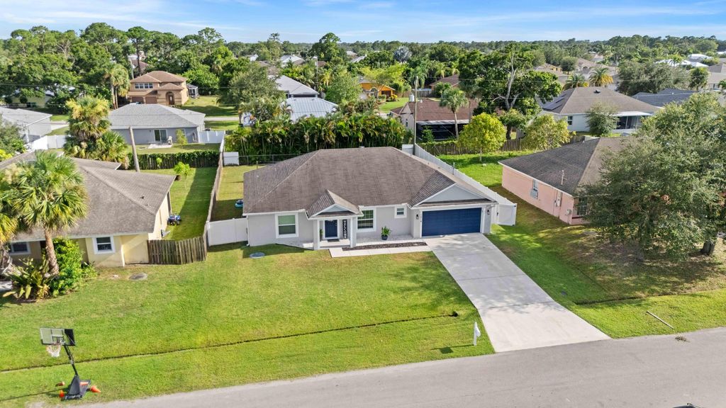 Photo of 1214 SW Century Avenue, Port Saint Lucie, FL 34953 (MLS # R11114135)