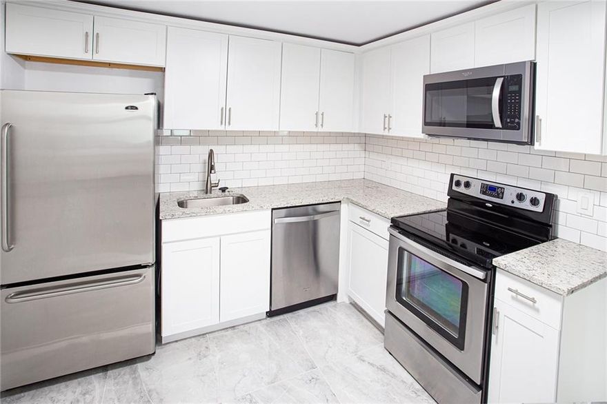 Just remodeled totally , 3/2 wonderful for new family , commercial or residential  loan . The land contains 4 land which could be used for commercial (Gold mine!) or residential . investor dream as well .