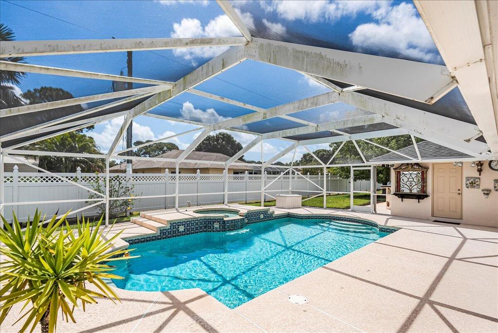 Photo of 2465 SE Elston Street, Port Saint Lucie, FL 34952 (MLS # R10983101)