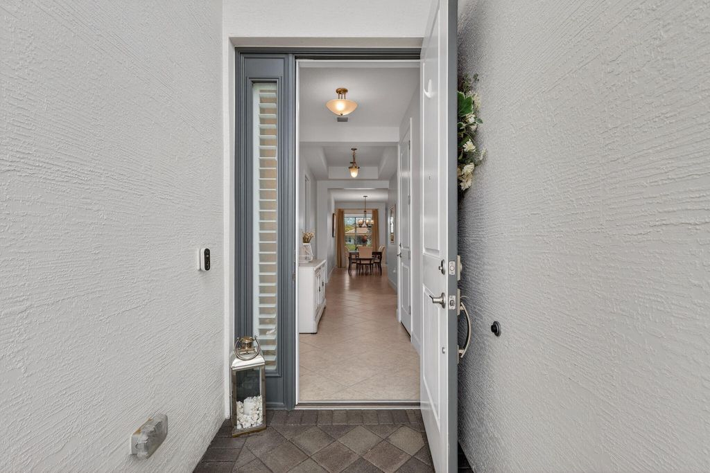 Photo of 11377 SW Willow Lane, Port Saint Lucie, FL 34987 (MLS # B26011043)