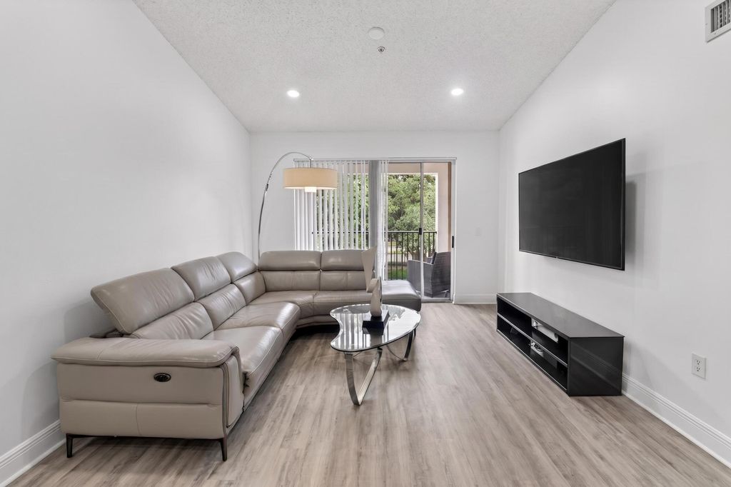 Photo of 8020 N Nob Hill Road #305, Tamarac, FL 33321 (MLS # B26033282)