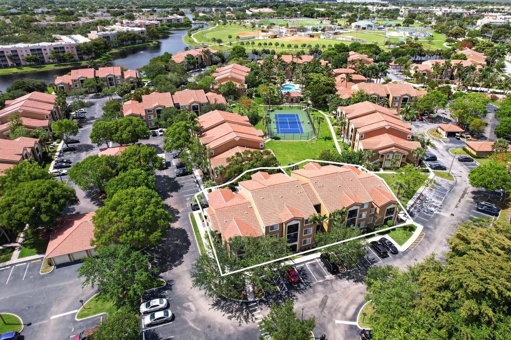 Photo of 8020 N Nob Hill Road #305, Tamarac, FL 33321 (MLS # B26033282)
