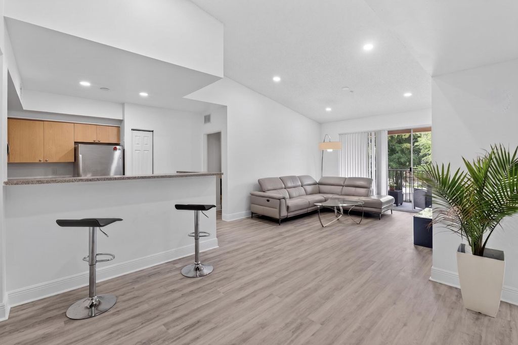 Photo of 8020 N Nob Hill Road #305, Tamarac, FL 33321 (MLS # B26033282)
