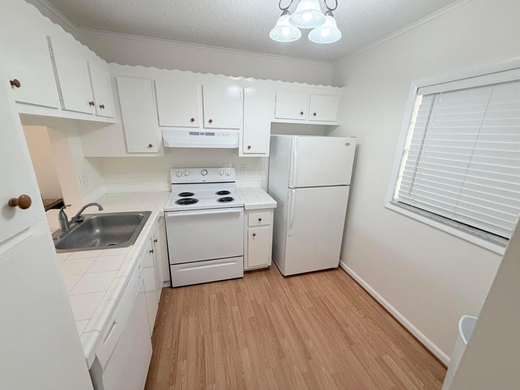 Photo of 9230 Lagoon Place #110, Davie, FL 33324 (MLS # B26042699)