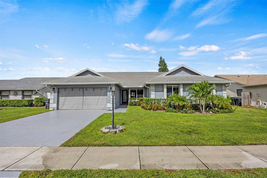 Photo of 8441 Winnipesaukee Way, Lake Worth, FL 33467 (MLS # F10530092)